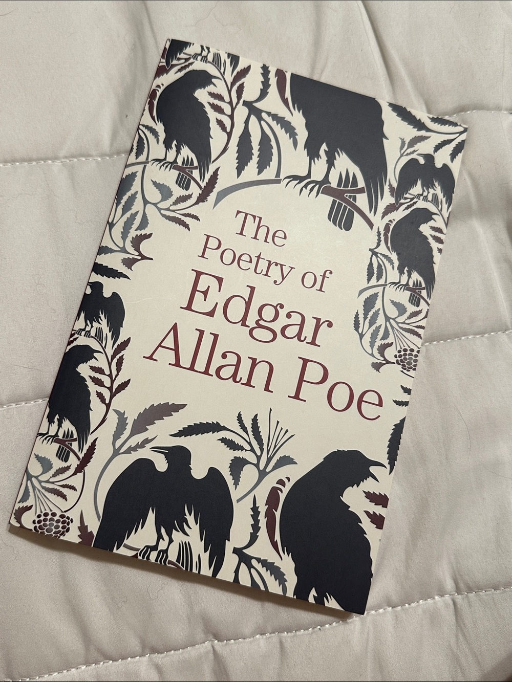 Poetry by Poetry — Black & Cream Raven Cover